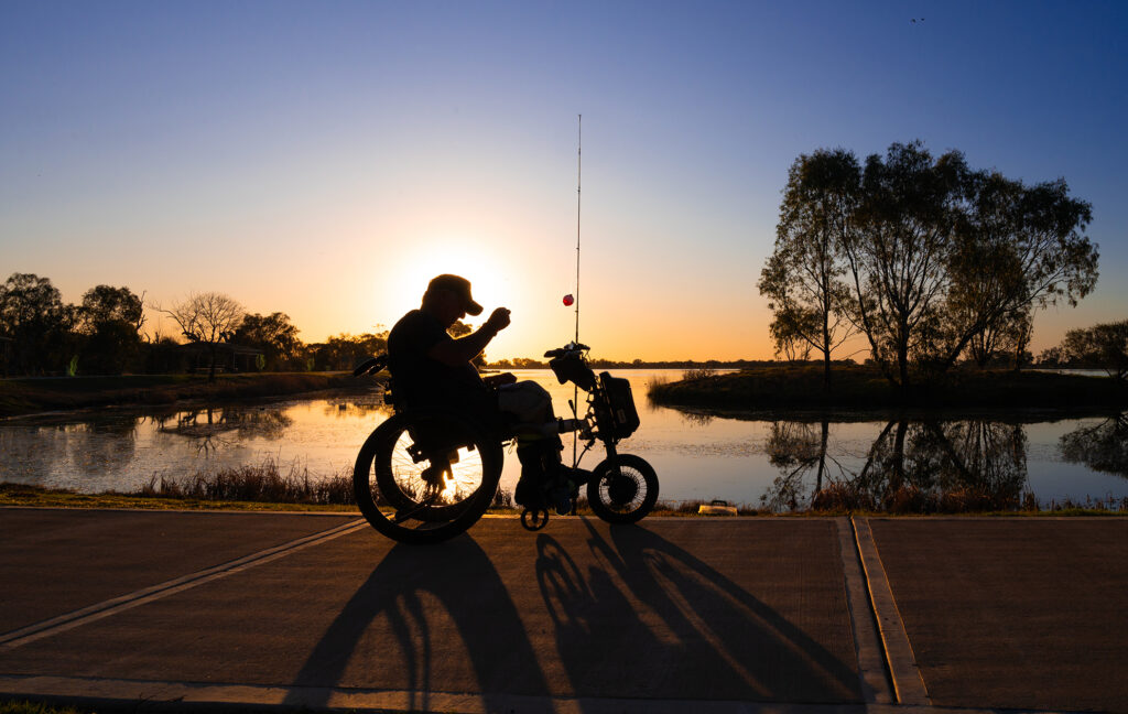 Sunset Fishing man in wheelchair gum bend lake